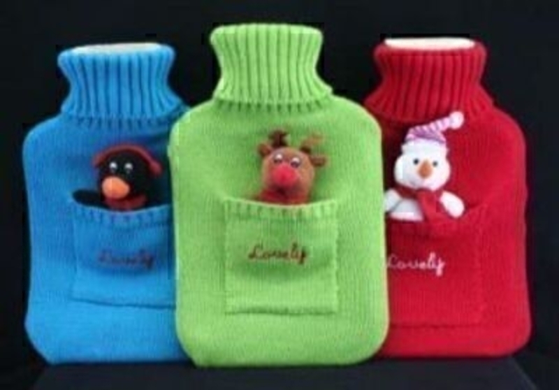 Choice of 3 Christmas hot water bottle by Gisela Graham. If preference please specify Red, Blue or Green when ordering. Size 33x21